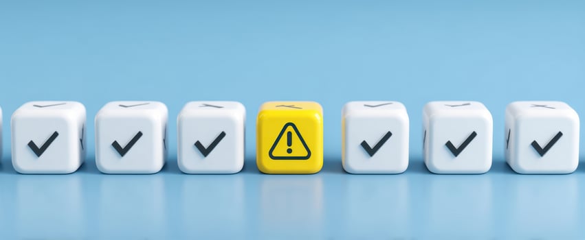 The warning cube among checkmarks illustrating decision-making and caution. photo