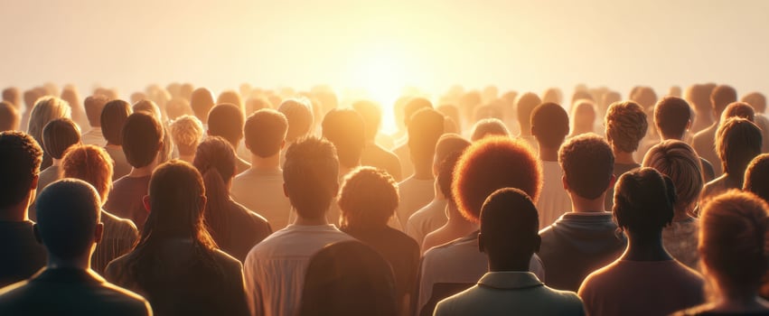 The Diverse Crowd Awaits the Sunrise with Hopeful Anticipation photo