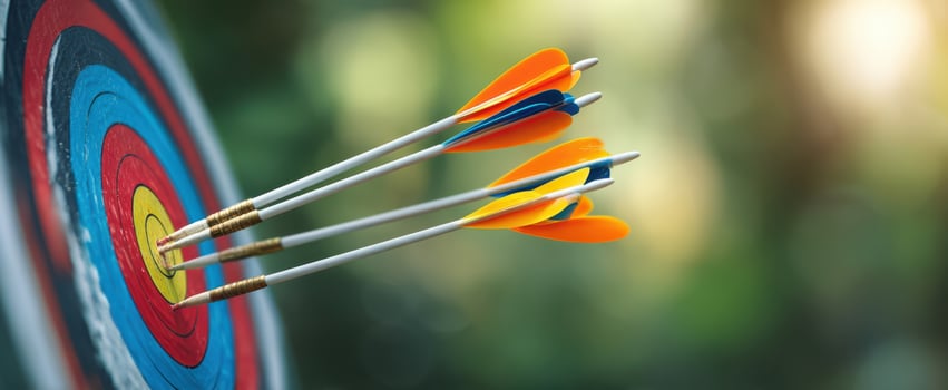The colorful arrows striking the target in a vibrant archery scene. photo
