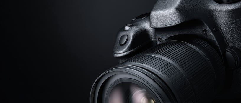 The sleek DSLR camera with a detailed lens and professional design. photo