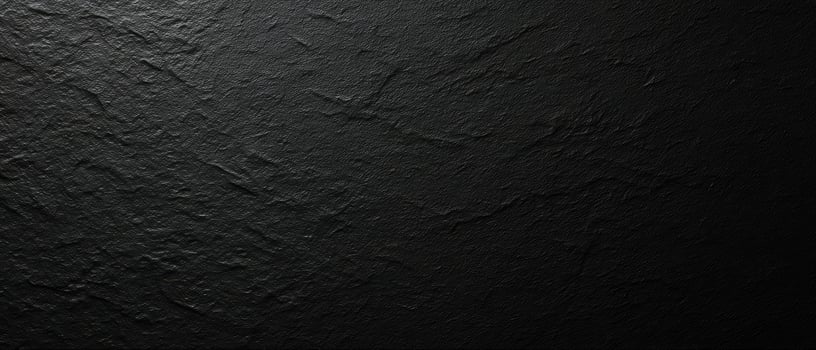 The textured black surface emphasizing minimalist elegance and modern design. photo