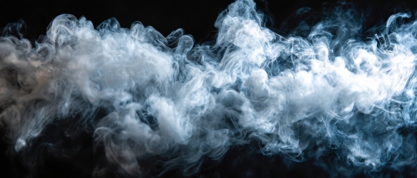 The Ethereal Dance of Smoke Against a Dark Background. photo