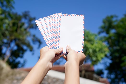woman shows the envelope to be distributed on the day of Eid photo