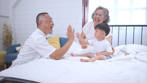 Before putting the kids to bed, grandparents, and kid unwind and play in the bedroom,293 photo