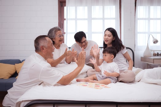 Before putting the kids to bed, parents, grandparents, and kid unwind and play in the bedroom,186 photo