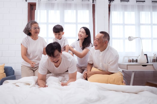 Before putting the kids to bed, parents, grandparents, and kid unwind and play in the bedroom,185 photo