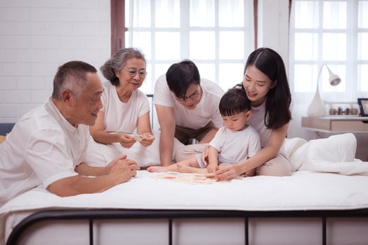Before putting the kids to bed, parents, grandparents, and kid unwind and play in the bedroom,184 photo