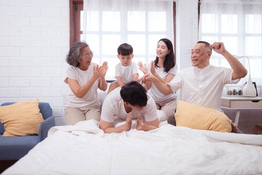 Before putting the kids to bed, parents, grandparents, and kid unwind and play in the bedroom,170 photo