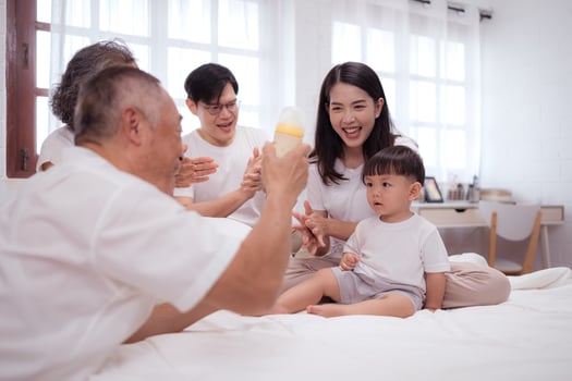 Before putting the kids to bed, parents, grandparents, and kid unwind and play in the bedroom,162 photo