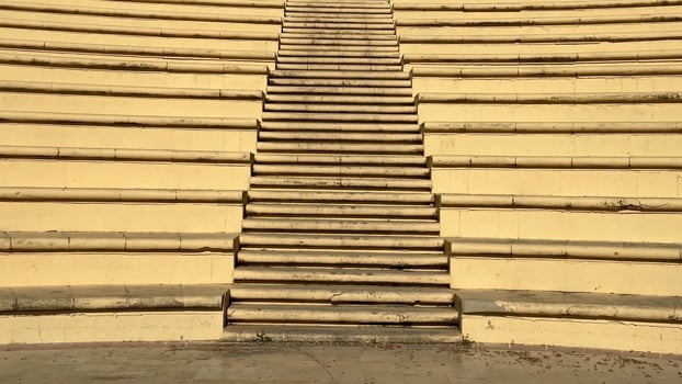The amphitheater steps, surrounded by lush greenery, create a perfect space for events and gatherings photo