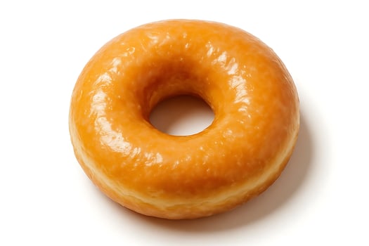 A glazed donut is shown on a white background photo