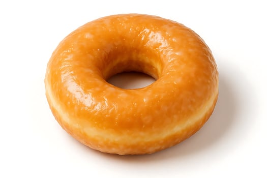 A glazed donut on a white background photo