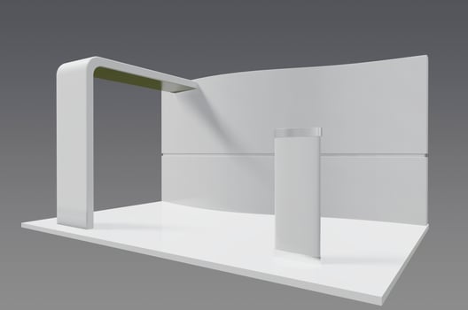 A white wall with a door and a light photo