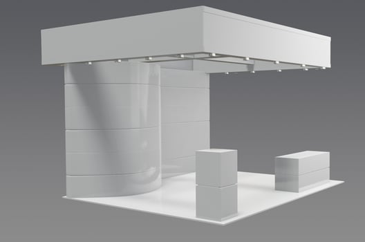 A white booth with a white wall and a white table photo