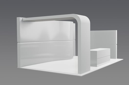 A white wall with a door and a table photo
