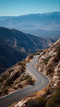 A Lengthy And Meandering Road That Traverses The Mountains photo