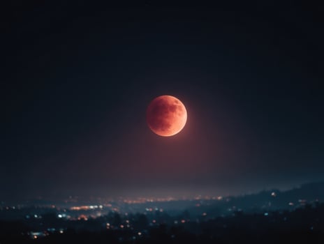 A Night Sky View Of A Total Lunar Eclipse photo