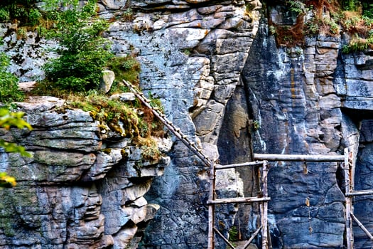 Mountaineering. Polygon, practice mountain area for rock climbing training photo