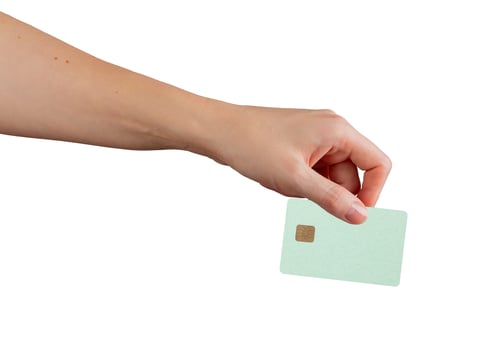 Female client using bankcard at store. Woman holding debit card in hand for payment, transferring photo
