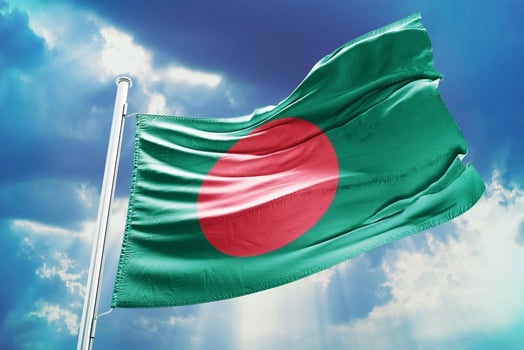 Bangladesh flag on blue sky photo
