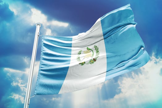 Guatemala flag on blue sky photo