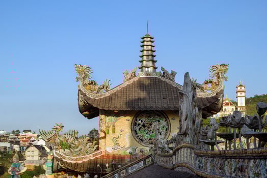 Ancient Asian Temple Architecture with Intricate Dragon Detail. Linh Phuoc Pagoda, Dalat, Vietnam. photo