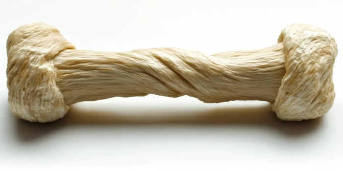 A dog bone with a rope around it photo