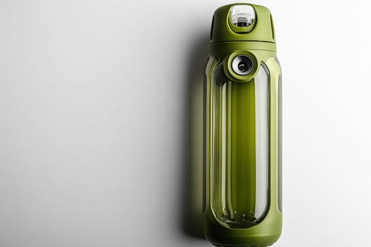 A green water bottle with a lid on it photo
