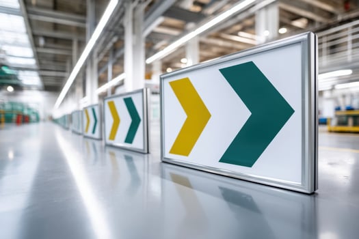 Finished road signs displayed in modern production area showcasing quality craftsmanship and design photo