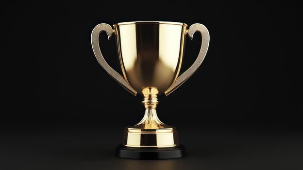 Golden trophy on black backgrounds photo