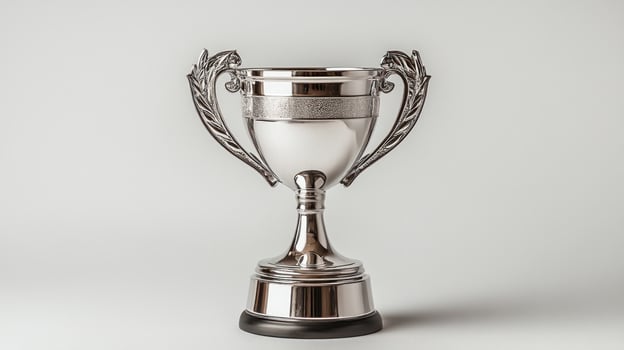 Silver trophy on a plain background photo