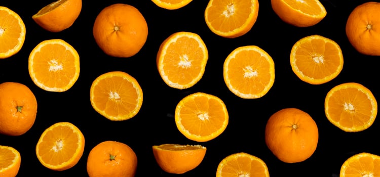 Banner with Oranges on Black Background, healthy food. photo