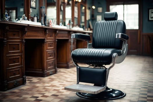 Empty barber chair sitting in stylish barbershop awaiting customer photo
