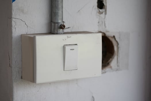Light switch installation process residential area home improvement indoor setting close-up view diy tips and techniques photo