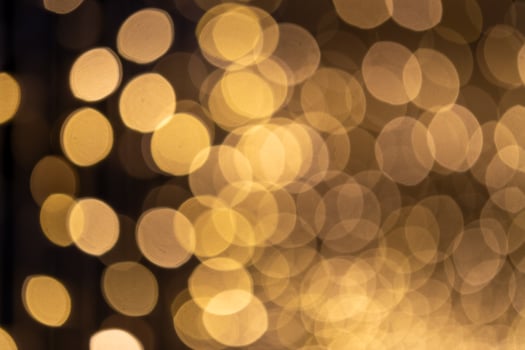 Festive light bokeh holiday celebration photography indoor setting close-up view visual aesthetics for seasonal decor inspiration photo