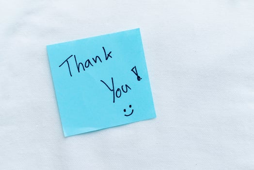 Gratitude expression office setting note minimalist environment personal touch business appreciation concept photo
