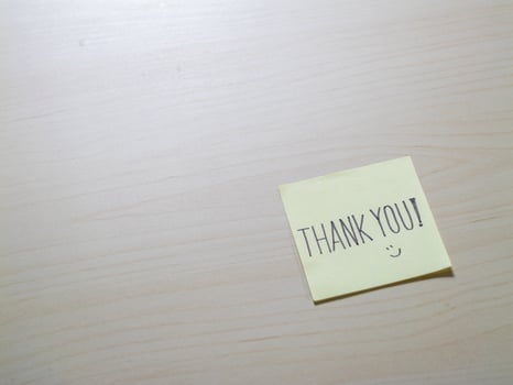 Thank you note on minimalist home office stationery a gratitude close-up photo
