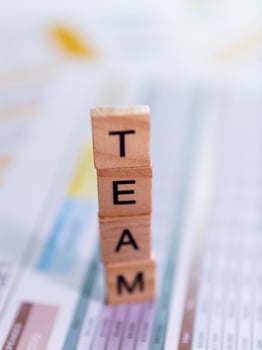 Motivational team collaboration close-up in a professional office environment photo
