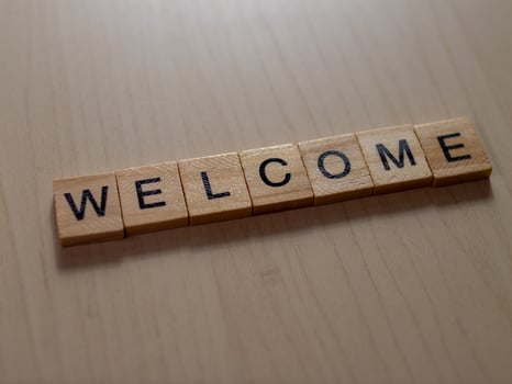 Creative welcome sign for home decor digital image in a warm indoor setting photo