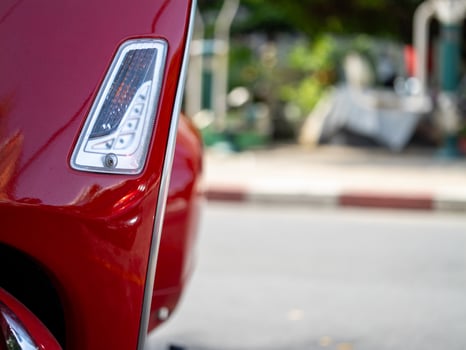 Car detail close-up urban setting automotive daylight focus design photo