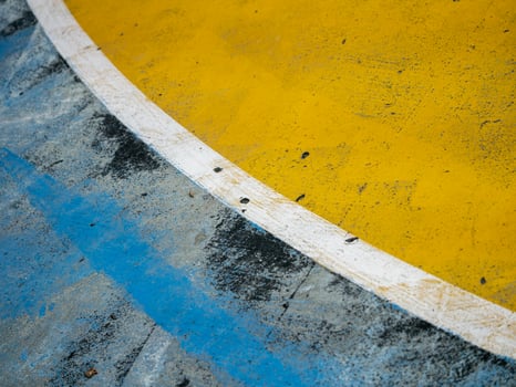 Aerial view of colorful basketball court lines in urban park abstract geometry for sports fans photo