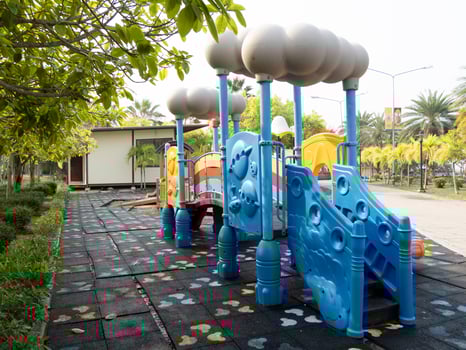 Children playing colorful playground equipment a park outdoor fun bright environment photo