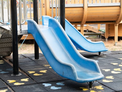 Exciting playground slide adventure urban park outdoor low angle fun for kids photo