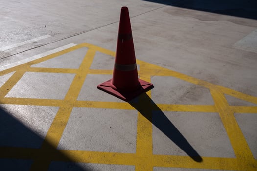 Traffic safety alert parking cone highlighting caution urban environment photo