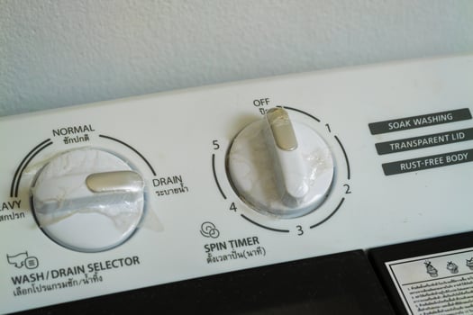 Washing machine control settings home appliance domestic close-up user experience photo
