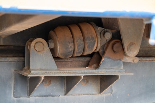 Warehouse engineering shock absorber inspection for industrial equipment maintenance photo