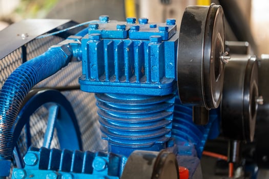 Industrial machinery operation factory floor equipment focus close-up mechanical components photo