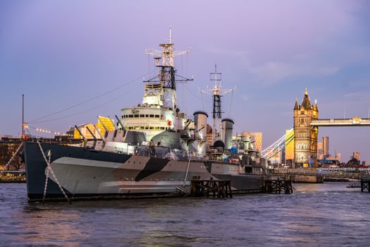 Historic battleship by Tower Bridge photo