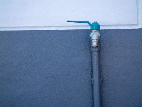 Plumbing in urban homes close-up of modern water faucet installation for improvement photo
