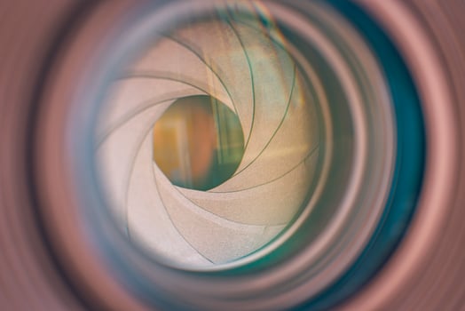 Creative macro closeup of camera lens with abstract reflections and textures, artistic photography detail, modern tech concept, vibrant colors, and sharp focus for design inspiration photo